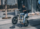 man-doing-wheelie-eunorau-flash-electric-moped-ebike-in-canada