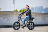 man-riding-eunorau-flash-electric-moped-ebike-in-calgary