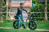 man-standing-on-eunorau-flash-electric-moped-ebike-in-canada
